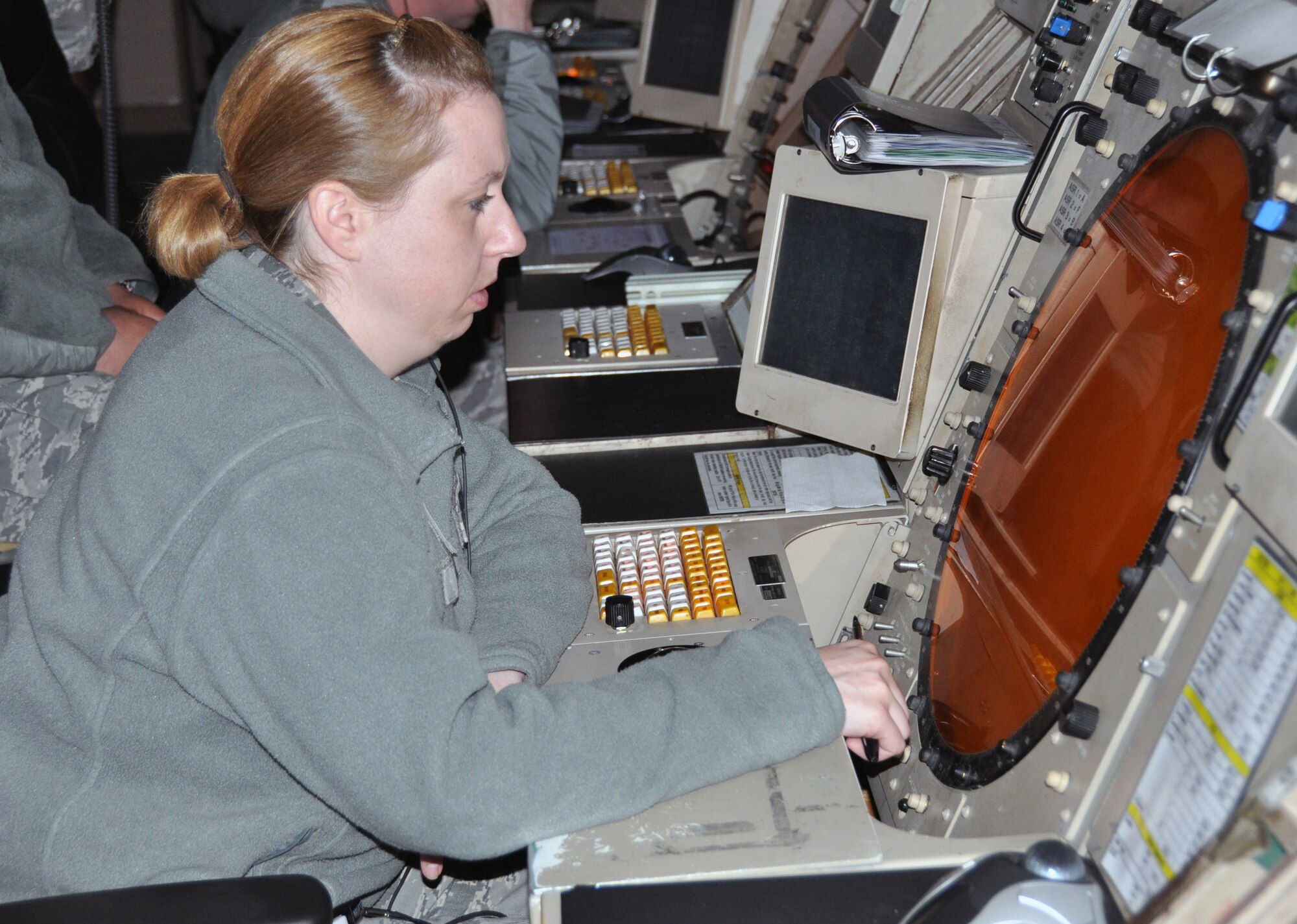 Tech. Sgt. Amanda Pierce, 51st Operations Support Squadron RAPCONcontroller, monitors the skies above Osan Air Base by radar May 9, 2012. (U.S. Air Force photo/Airman 1st Class Michael Battles)