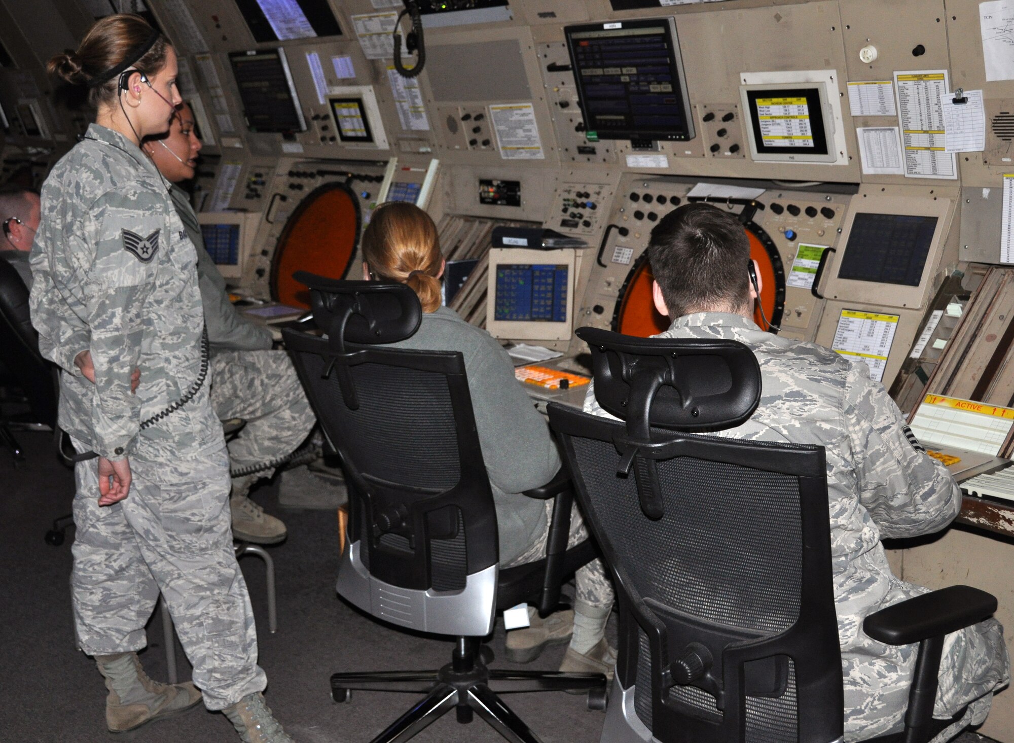 Members of the 51st Operations Support Squadron radar approach and control monitor aircraft in Osan air base’s airspace May 9, 2012. (U.S. Air Force photo/Airman 1st Class Michael Battles)