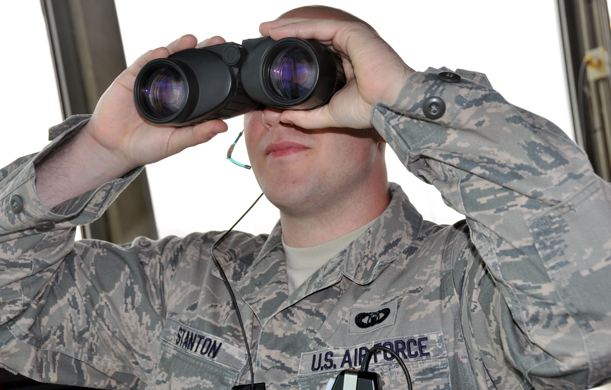Staff Sgt. Kevin Stanton, 51st Operations Support Squadron air traffic controller journeyman, surveys the flightline during a routine aircraft landing at Osan Air Base, Republic of Korea, May 9, 2012. (U.S. Air Force photo/Airman 1st Class Michael Battles)
