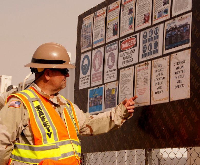 AFGHANISTAN — Jeffrey Ice, a U.S. Army Corps of Engineers Afghanistan Engineer District - South safety specialist, reviews the safety board at a USACE construction site in Helmand province May 8, 2012.