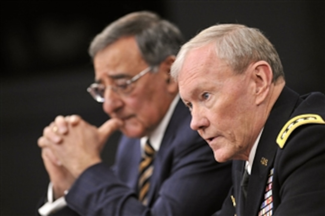 Chairman of the Joint Chiefs of Staff Gen. Martin E. Dempsey answers a reporter's question as he and Secretary of Defense Leon E. Panetta hold a press conference in the Pentagon on May 10, 2012.  