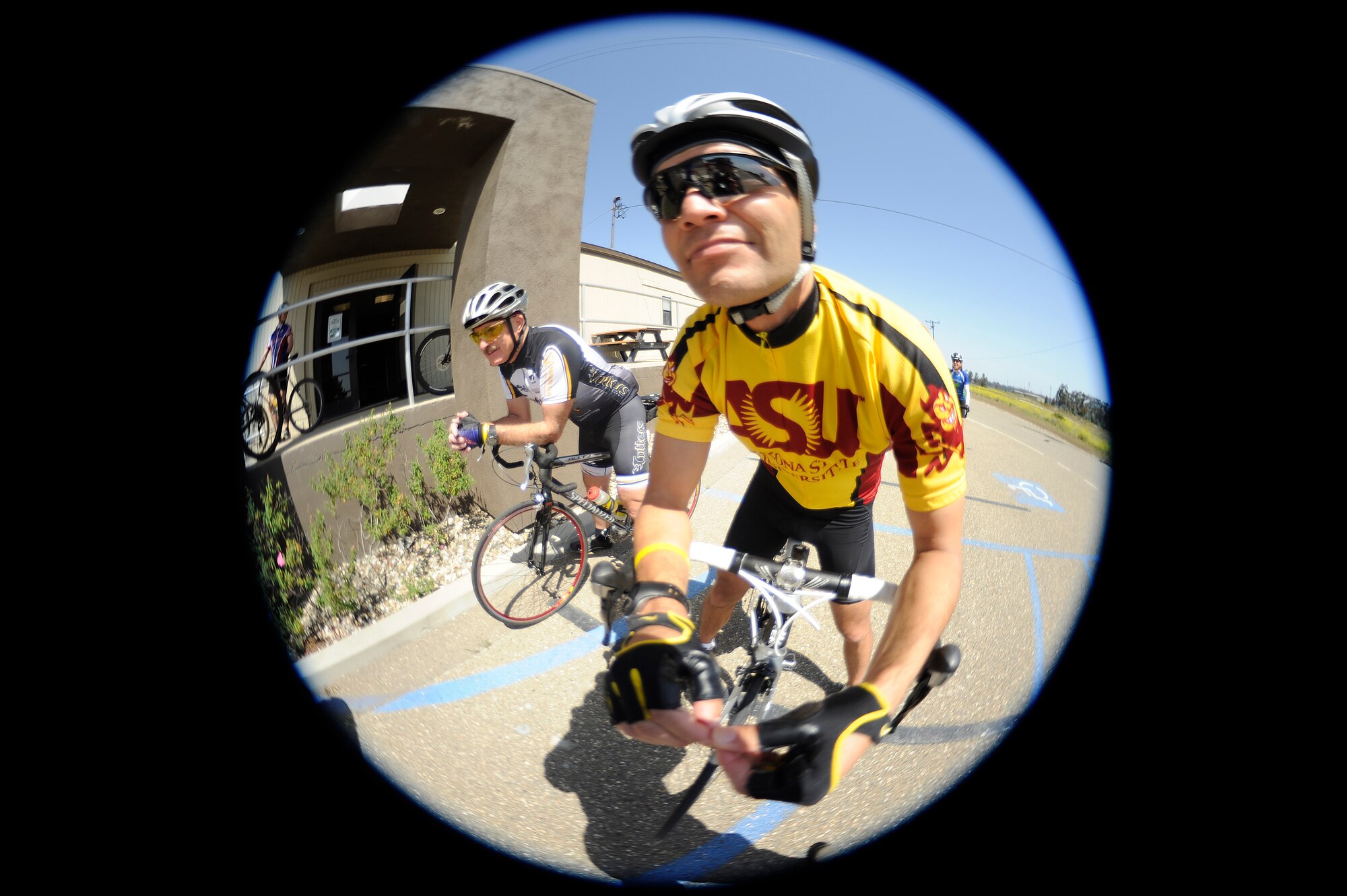 VANDENBERG AIR FORCE BASE, Calif. -- Chief Master Sgt. Alex Escarcega, chief enlisted manager for the 9th Space Operations Squadron, enjoys a moment in the sun before starting a 40-minute bike ride Tuesday, May 15, 2012. The City of Santa Barbara designated May 15 as its third annual Bike From Work Day. (U.S. Air Force photo/Staff Sgt. Erica Picariello)

 