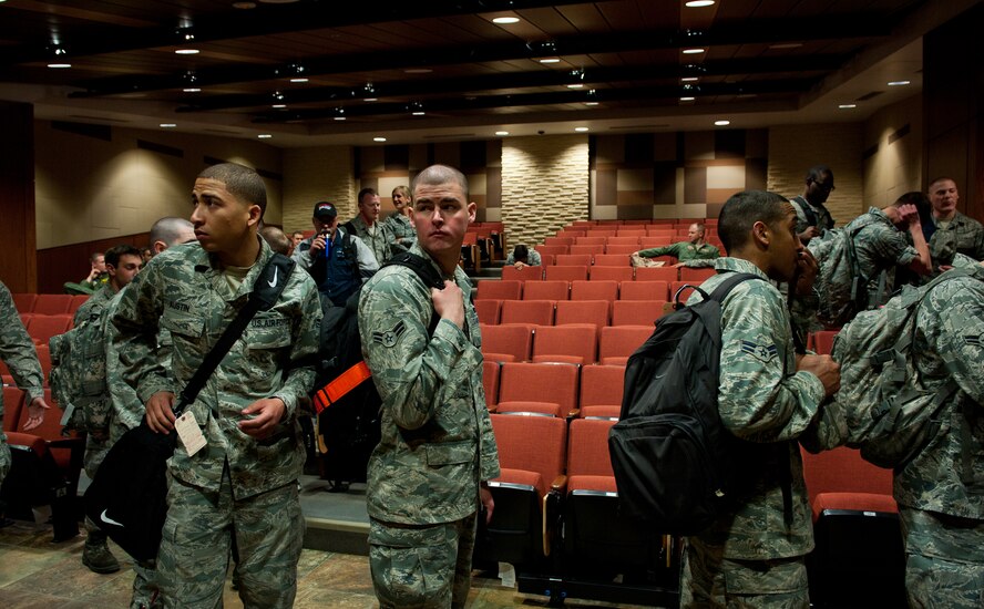 Ellsworth Air Force Base, S.D., Airmen wait in the auditorium of the deployment center in preparation to leave for Green Flag, a combat training exercise at Nellis AFB, Nev., May 10, 2012. Ellsworth’s new deployment center will be a multi-use facility, hosting several operations including deployment processing, training and the base’s upcoming 70th Anniversary Kick-off Celebration. (U.S. Air Force photo by Airman 1st Class Kate Thornton/Released)