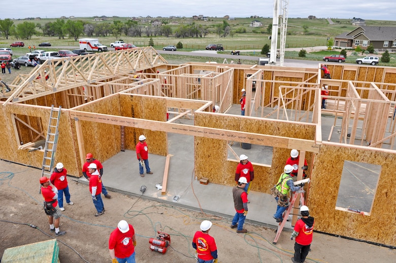 PARKER, Colo. -- Volunteers work on a home for Nick Orchowski, an injured Operation Iraqi Freedom combat veteran, May 11, 2012. Approximately 60 volunteers from Buckley Air Force Base, Colo. helped with the construction of Orchowski's new home. (U.S. Air Force photo by Senior Airman Christopher Gross)