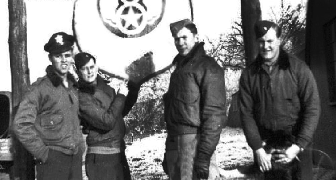 Retired Capt. Art Juhlin, 100th Bomb Group lead crew navigator (third from left), stands with three of his fellow aviators at the Royal Air Force Station Thorpe Abbotts, England in 1944. When Juhlin finished navigation training at Rapid City Army Air Base, he was assigned to the 100th BG operating out of England, assisting the allied forces during World War II. (U.S. Air Force Courtesy Photo/Released)