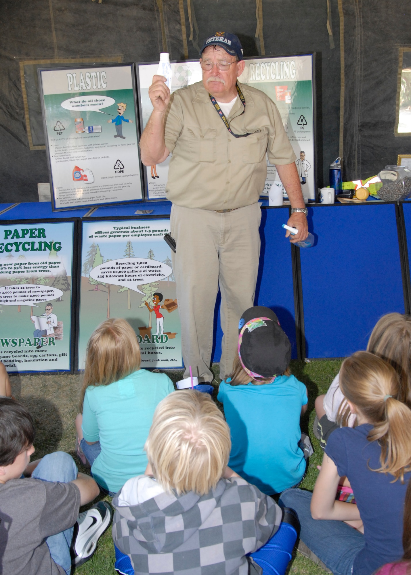 Thomas Allen, 95th Civil Engineering Division, educates Branch Elementary School students about where plastic comes from and the importance of recycling, during the fourth annual science carnival. Allen's presentation was one of five that students had the opportunity to learn from. (U.S. Air Force Photo by Laura Mowry)