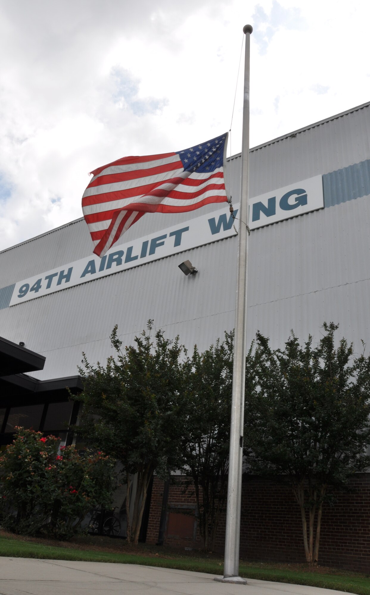 The Dobbins Air Reserve Base flag is flown at half staff on May 15 in honor of Peace Officers Memorial Day and Police Week 2012. (U.S. Air Force photo/Airman 1st Class Elizabeth Gaston)