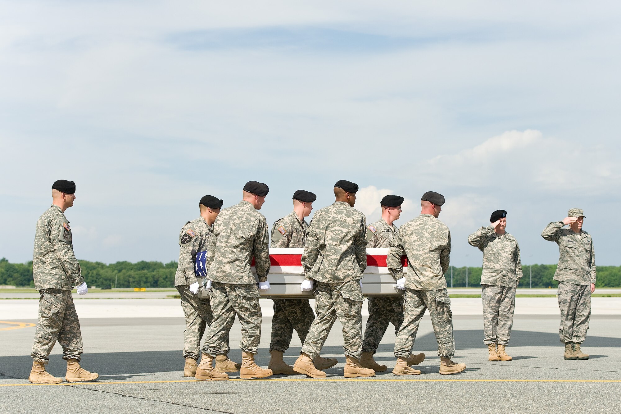 A U.S. Army carry team transfers the remains of Army Staff Sgt. Israel P. Nuanes, of Las Cruces, N.M., at Dover Air Force Base, Del., May 15, 2012. Nuanes was assigned to the 741st Ordnance Company, EOD, Fort Bliss, Texas. (U.S. Air Force photo/Roland Balik)