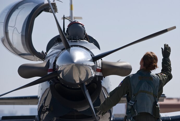 1st. Lt. Kristen Smith, 33rd Flying Training Squadron pilot, Vance Air Force Base, Okla., conducts a pre-flight inspection for a T-6A Texan II, during the Weapons Instructor Course May 8, 2012, at Nellis Air Force Base, Nev. The presence of the T-6A Texan II aircraft is the first time it has participated at the WIC. (U.S. Air Force photo by Staff Sgt. Christopher Hubenthal)