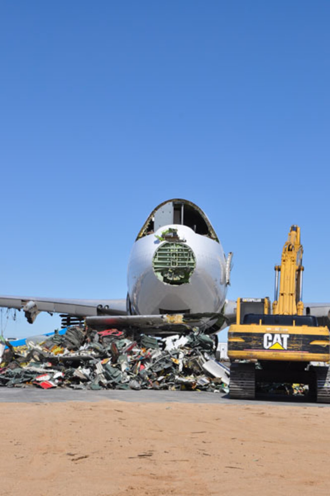 Depending on its size, a single aircraft can yield from 40,000 to 250,000 pounds of parts, according to Doug Scroggins of Aircraft Recycling Corporation.  In addition to tearing up planes, the company sells aircraft parts.  (Photo by Scott Johnston) 

