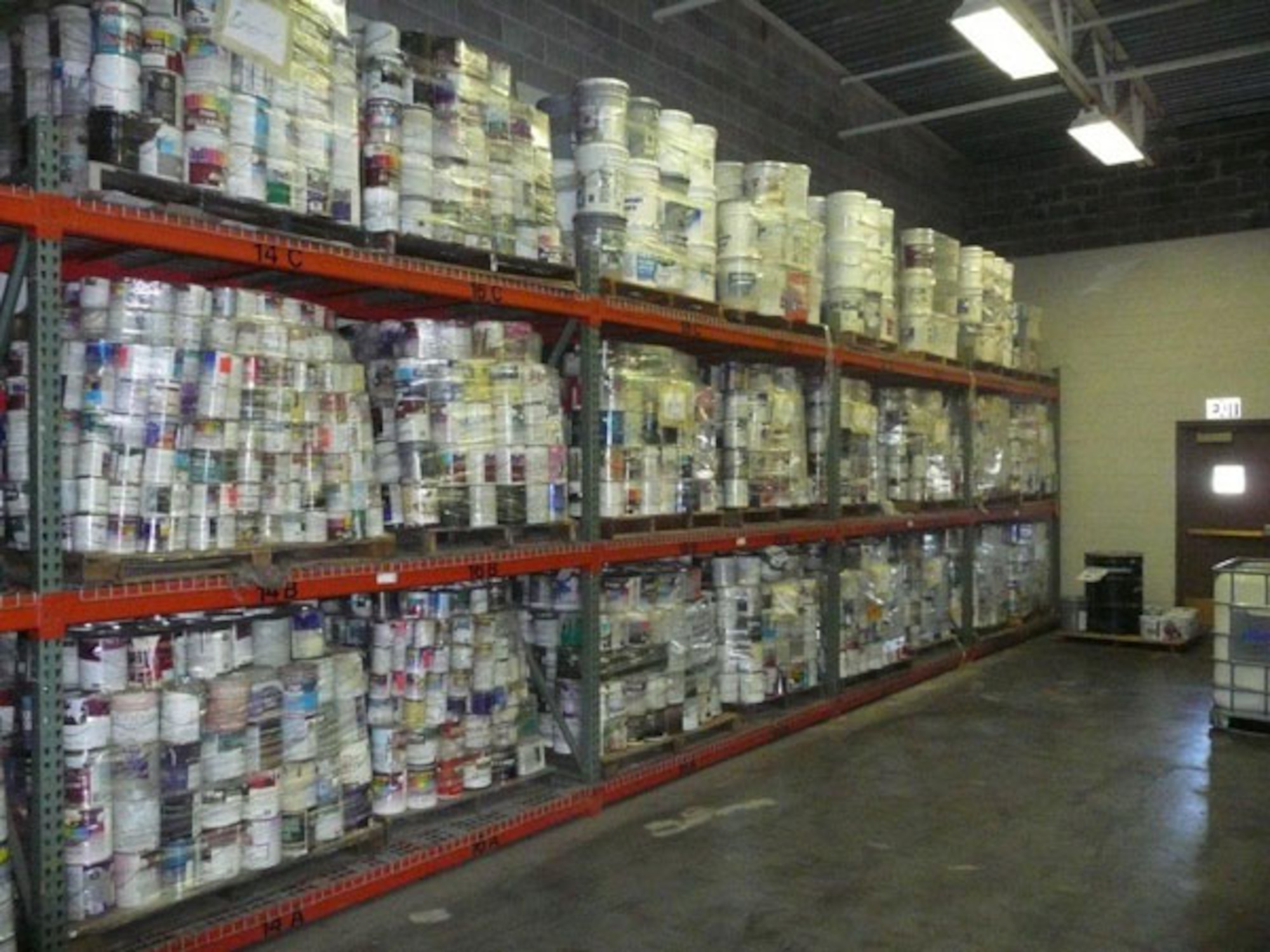 BEFORE -- Thousand of cans of leftover or unwanted paint are sorted and shelved at Visions Recycling, Inc., located at the former McClellan Air Force Base, prior to blending.  "We can make any color," says owner Jerry Noel, a former painting contractor.  (Courtesy photo) 
