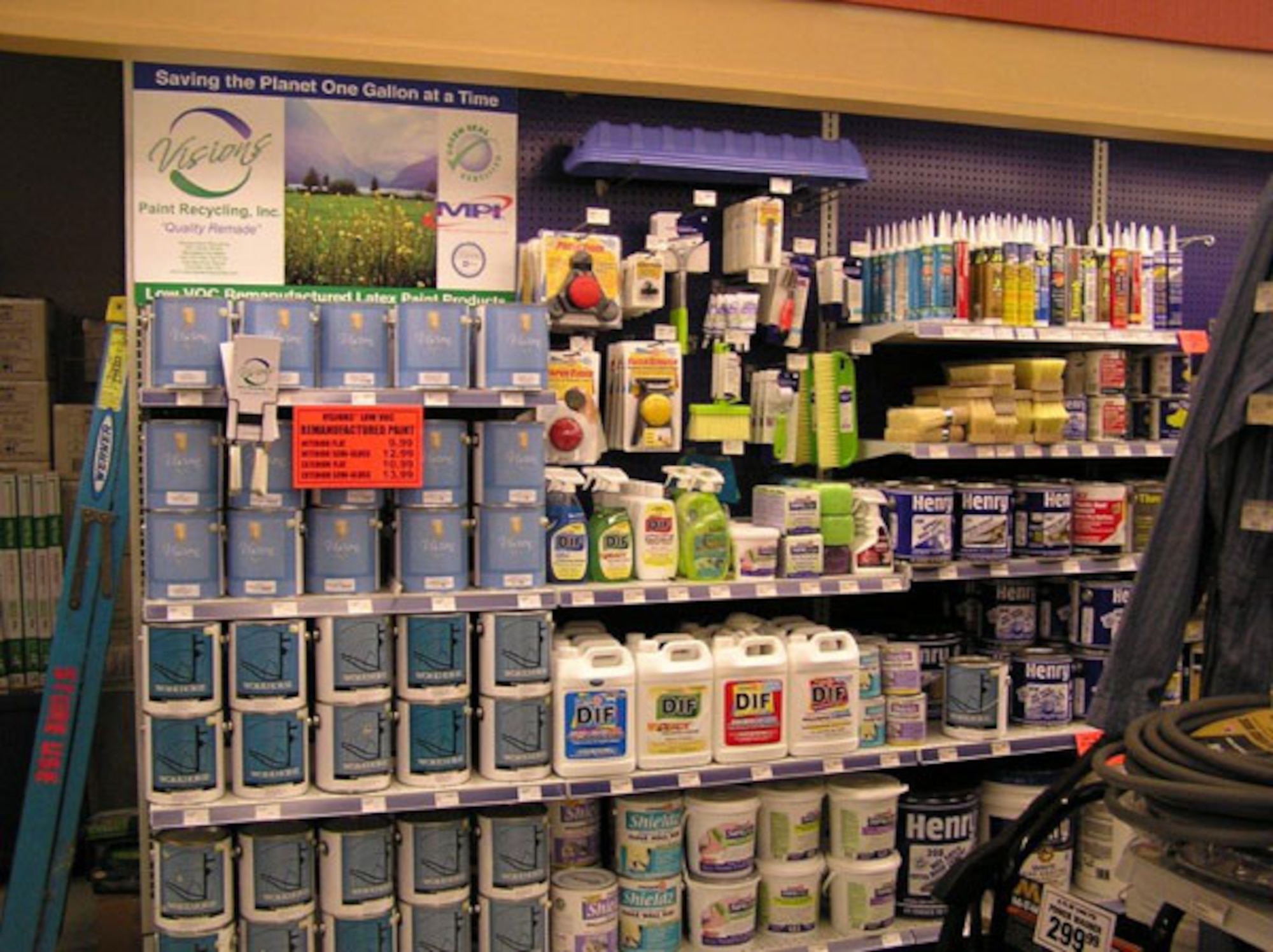 AFTER - Recycled paint is displayed at a hardware store with the company slogan, "Saving the Planet One Gallon at a Time."  Visions sold 140,000 gallons of recycled paint in 2011. (Courtesy photo)
