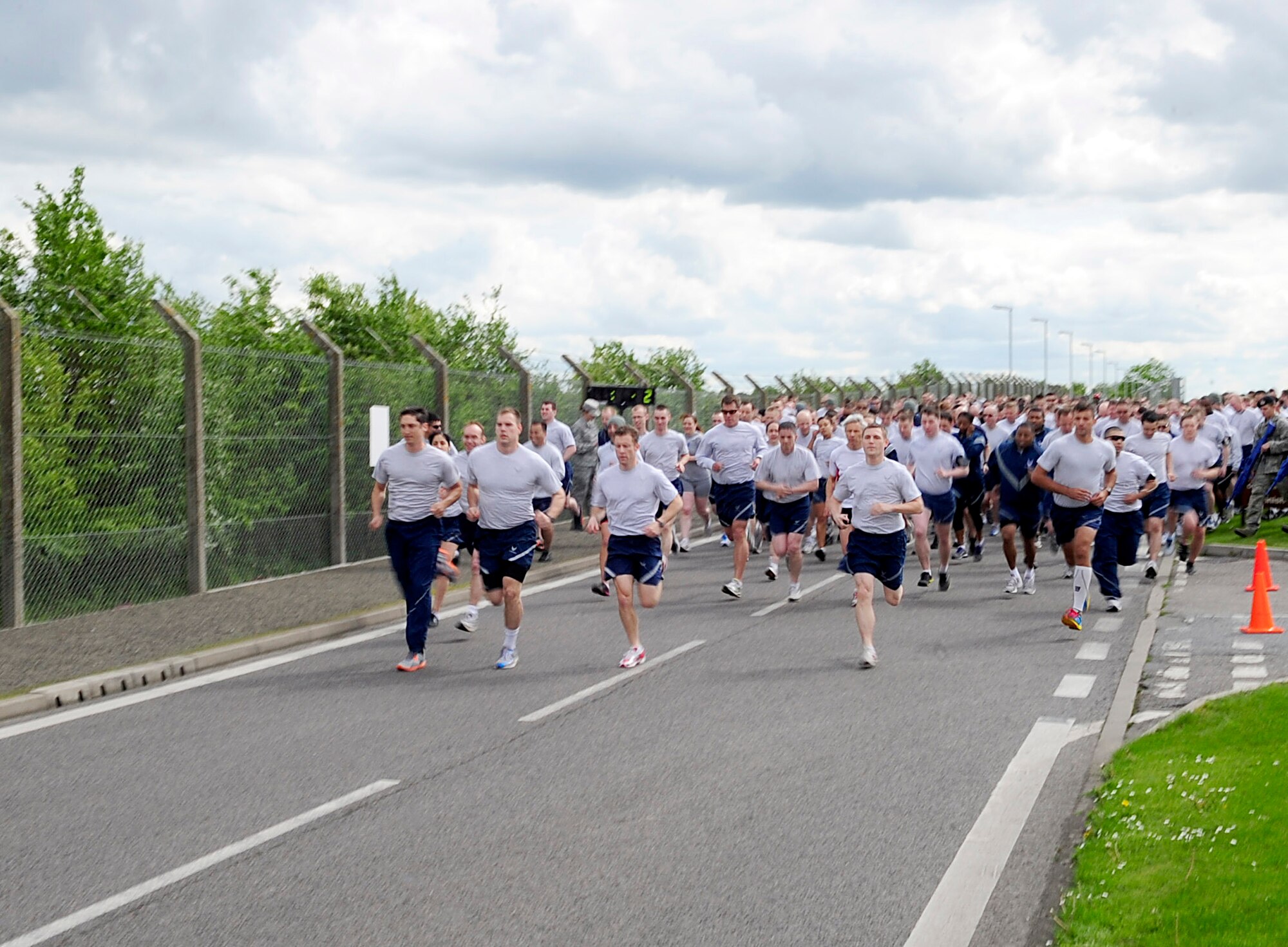 RAF MILDENHALL, England – Airmen begin the Team Mildenhall 5K run here May 11, 2012. The 100th Air Refueling Wing hosts a monthly 5K to help promote fitness and camaraderie. (U.S. Air Force photo/Senior Airman Ethan Morgan)