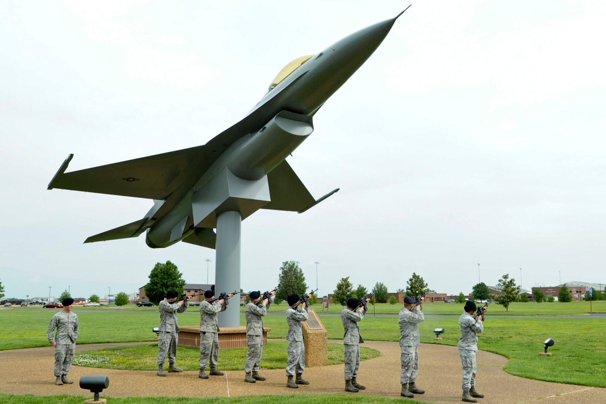 Members from the 633rd Air Base Wing Security Forces Squadron remember all police officers who lost their lives in the line of duty by way of a 21-gun salute during a retreat ceremony at Langley Air Force Base, Va., May 14, 2012. The ceremony was held as part of National Police Week. (U.S. Air Force photo by Senior Airman Wesley Farnsworth/Released)