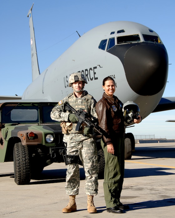 Lt. Col. Lisa Berente, a KC-135 pilot and Chief of Safety for the 151st Air Refueling Wing, poses in front of a KC-135.  Berente was recently featured in "Military Fly Moms," a coffee table book featuring military pilots who are also mothers.  (U.S. Air Force courtesy photo)