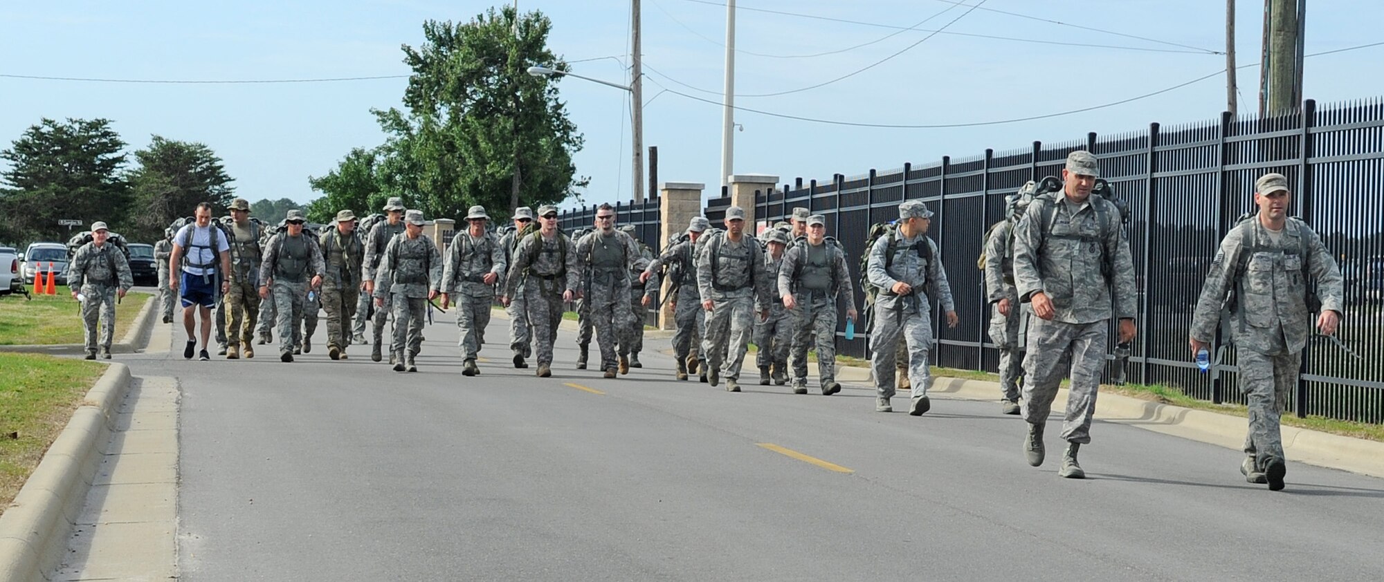 U.S. Air Force Airmen from the 4th Security Forces Squadron begin their ruck march for National Police Week on Seymour Johnson Air Force Base, N.C., May 14, 2012. The SFS Airmen marched in memory of all police officers who gave their lives in the line of duty. (U.S. Air Force photo/Senior Airman Gino Reyes/Released)