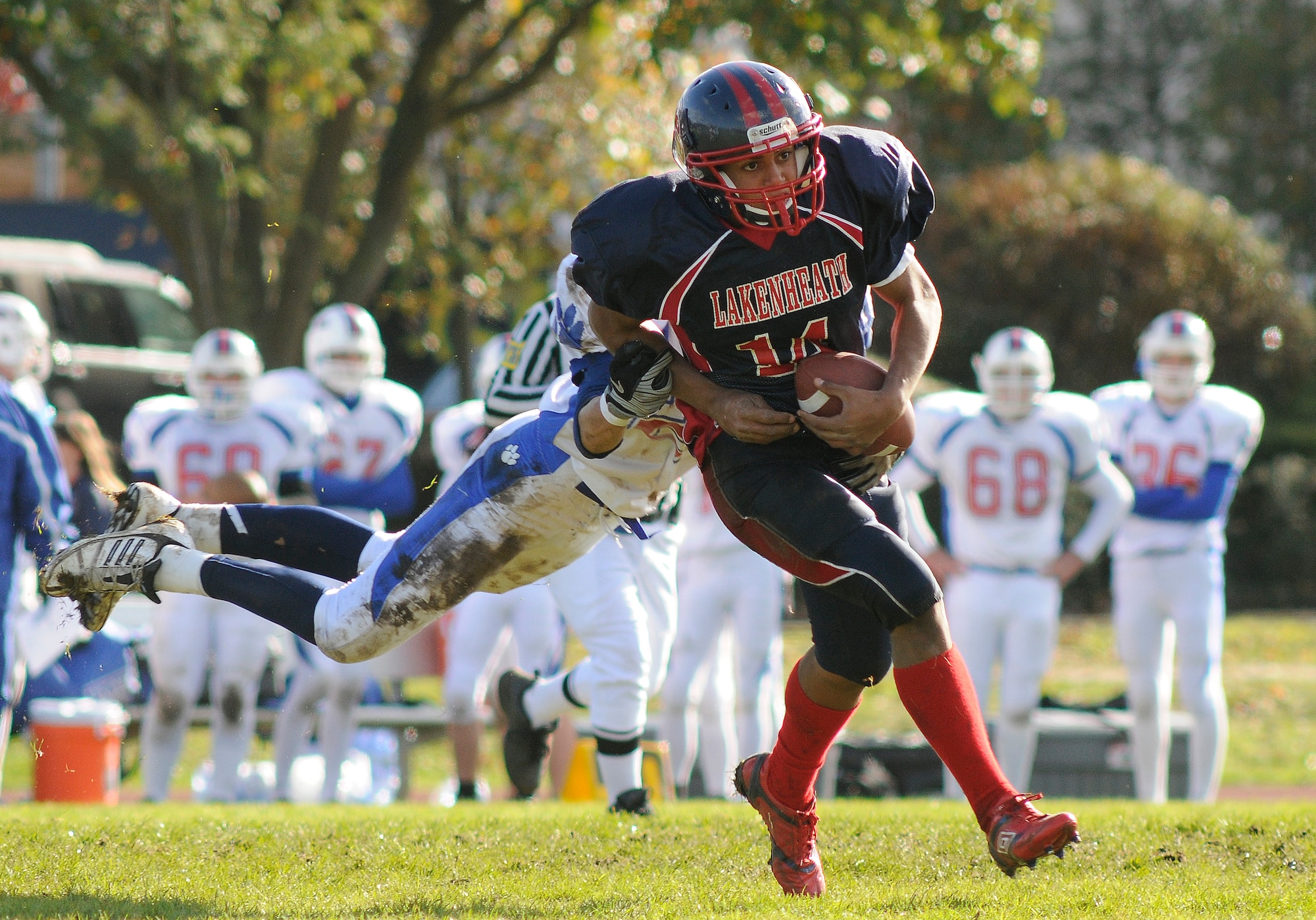 ROYAL AIR FORCE LAKENHEATH, England -- Xavier Thompson, Lakenheath Lancers' running back, runs the ball down the field during the homecoming game versus the Ramstein Royals Oct. 16, 2010.  Thompson was recently named 2012 Boys and Girls Club of America Youth of the Year for European Command.  (Courtesy photo by Tim Barlow)