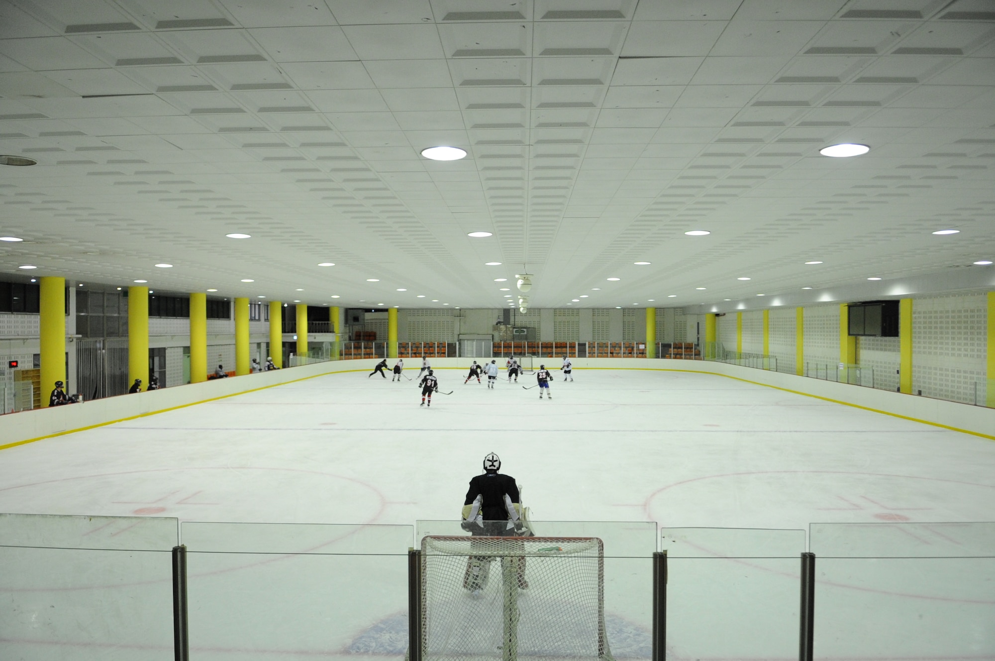 Airmen from Kunsan Air Base play with South Koreans during a hockey scrimmage May 13, 2012, in Jeonju, South Korea. Practice is held for about two hours before the players are split up to compete against each other during a short game. (U.S. Air Force photo/Senior Airman Brigitte N. Brantley)