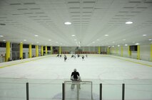Airmen from Kunsan Air Base play with South Koreans during a hockey scrimmage May 13, 2012, in Jeonju, South Korea. Practice is held for about two hours before the players are split up to compete against each other during a short game. (U.S. Air Force photo/Senior Airman Brigitte N. Brantley)