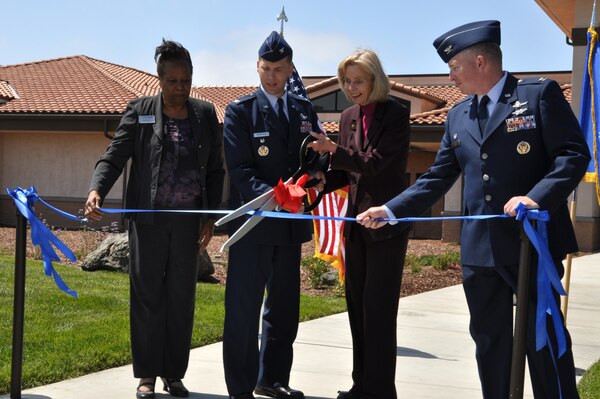 Child Development Center Director Verna Brown (left), Col. Paul McArthur, 30th Space Wing vice commander, Rep. Lois Capps and Col. Kelly Kirts, 30th Mission Support Group commander, cut the ribbon to the new CDC May 11. The $9.7 million, 23,390-square-foot facility consolidates the CDC's operations into one building while nearly doubling the floor space of the previous facilities. 
