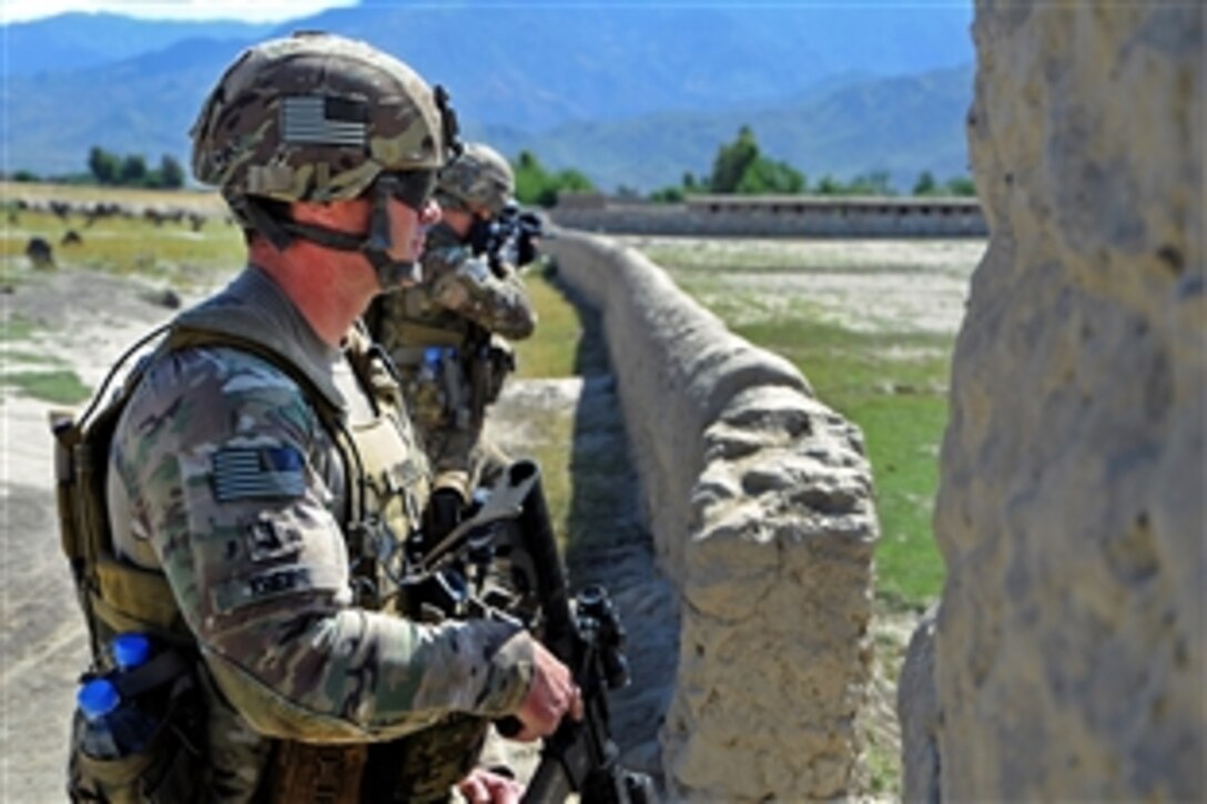 U.S. Army 1st Lt. Randal Krebs provides security as members of the Provincial Reconstruction Team Kunar staff conduct quality checks and speak to Afghan citizens as part of a patrol in Afghanistan's Kunar province, May 12, 2012. Krebs, a platoon leader, is assigned to Provincial Reconstruction Team Kunar, security force element, and is deployed from Company A, 1st Battalion, 143rd Infantry, Airborne.