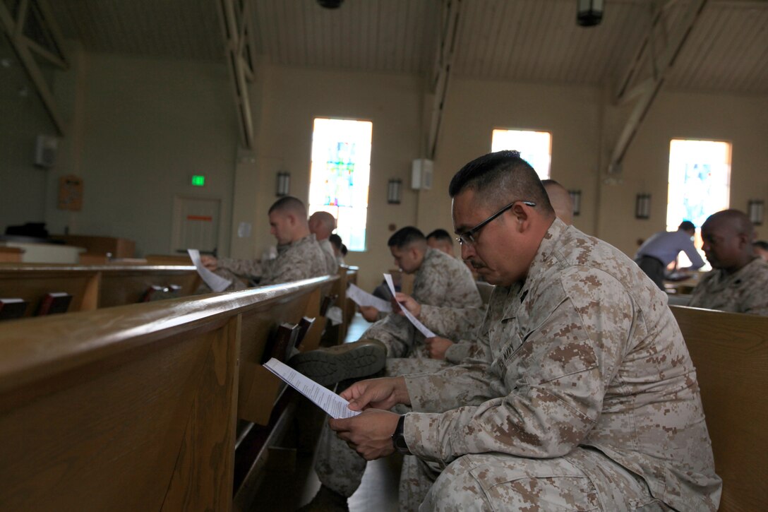 Marines, sailors and Department of Defense personnel view handouts given to them about transitioning from military to civilain employment at the Marketing Yourself presentation at the Marine Memorial Chapel on Camp Pendleton, May 15. The Military Officers Association of America offer their services free of charge to service members.