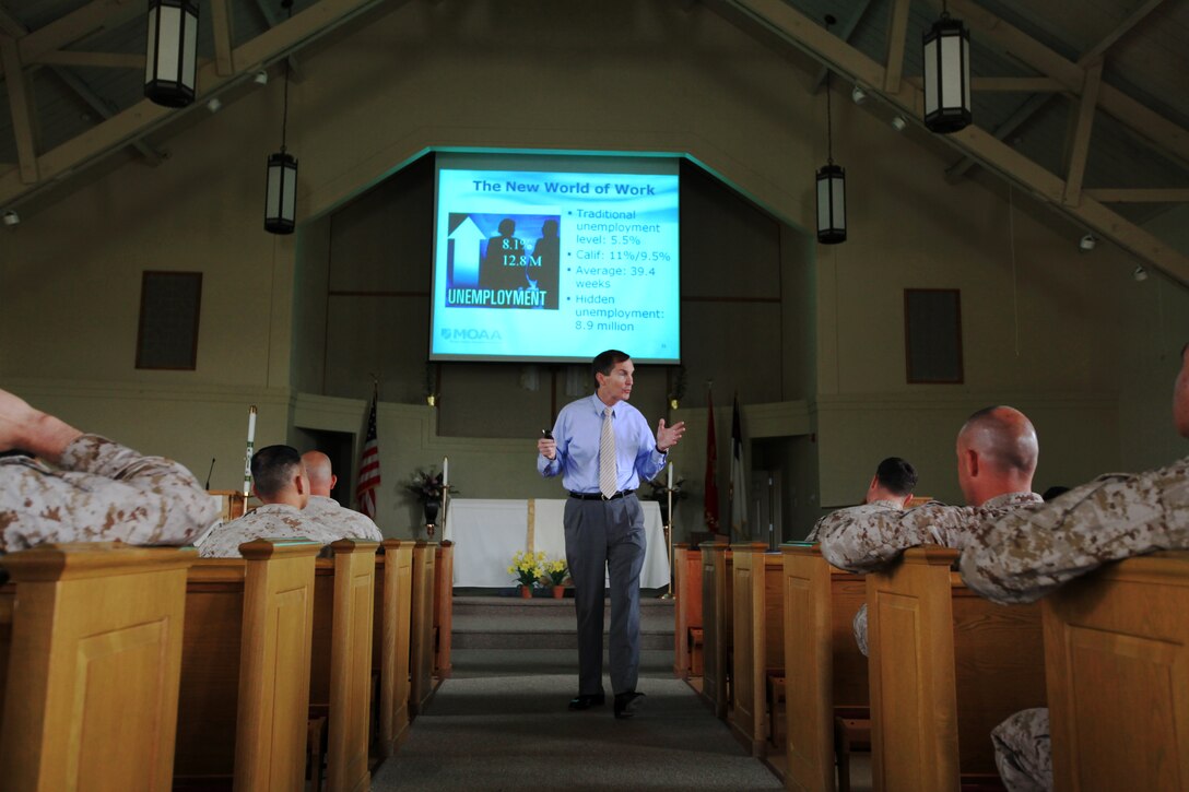 Jim Carman discusses wasys to help service members transition into the private sector at the Marketing Yourself presentation at the Marine Memorial Chapel on Camp Pendleton, May 15. Attendees learned from various job seeking skills ranging from developing a resume to interviewing and negotiating. Carman is the director for Transitions Services.