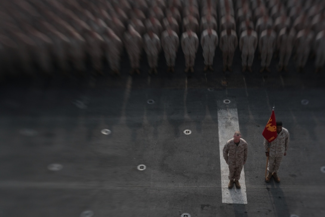 Marines and sailors serving with the 11th Marine Expeditionary Unit aboard USS Makin Island attend a ceremony commemorating the ship’s equator crossing May 15. The Marines serve with the 11th Marine Expeditionary Unit, which embarked the ship, as well as USS New Orleans and USS Pearl Harbor in San Diego Nov. 14, beginning a seven-month deployment to the Western Pacific, Horn of Africa and Middle East regions.