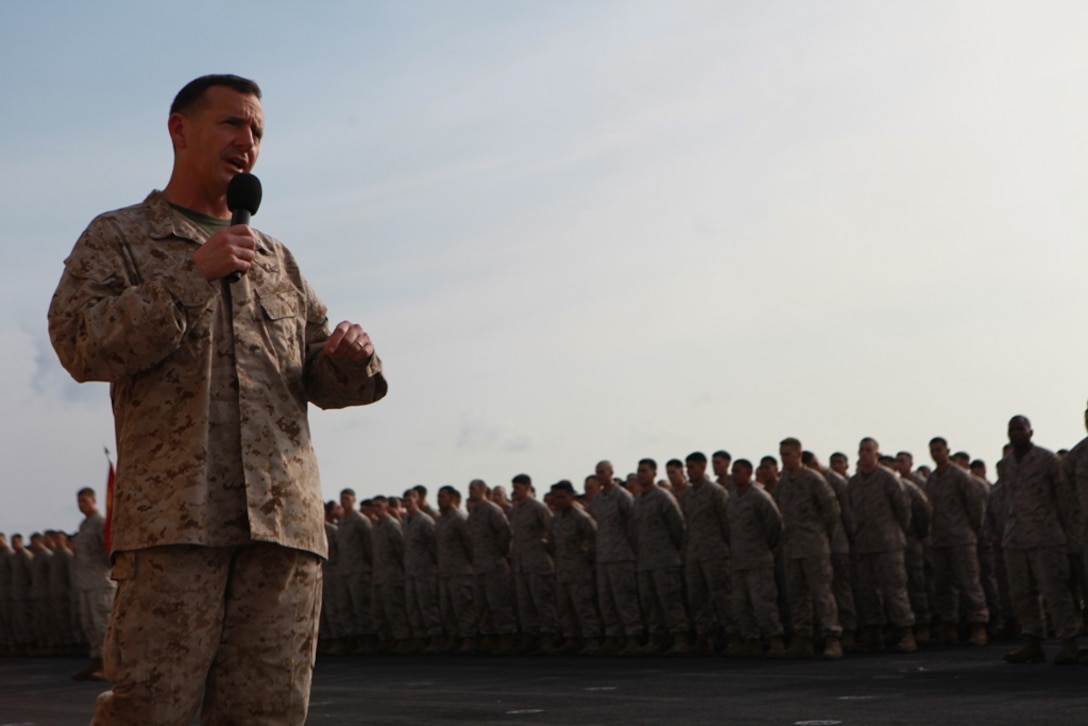 Eleventh Marine Expeditionary Unit commanding officer Col. Michael R. Hudson speaks to Marines aboard USS Makin Island during a ceremony commemorating the ship’s equator crossing May 15. The unit embarked the ship, as well as USS New Orleans and USS Pearl Harbor in San Diego Nov. 14, beginning a seven-month deployment to the Western Pacific, Horn of Africa and Middle East regions.