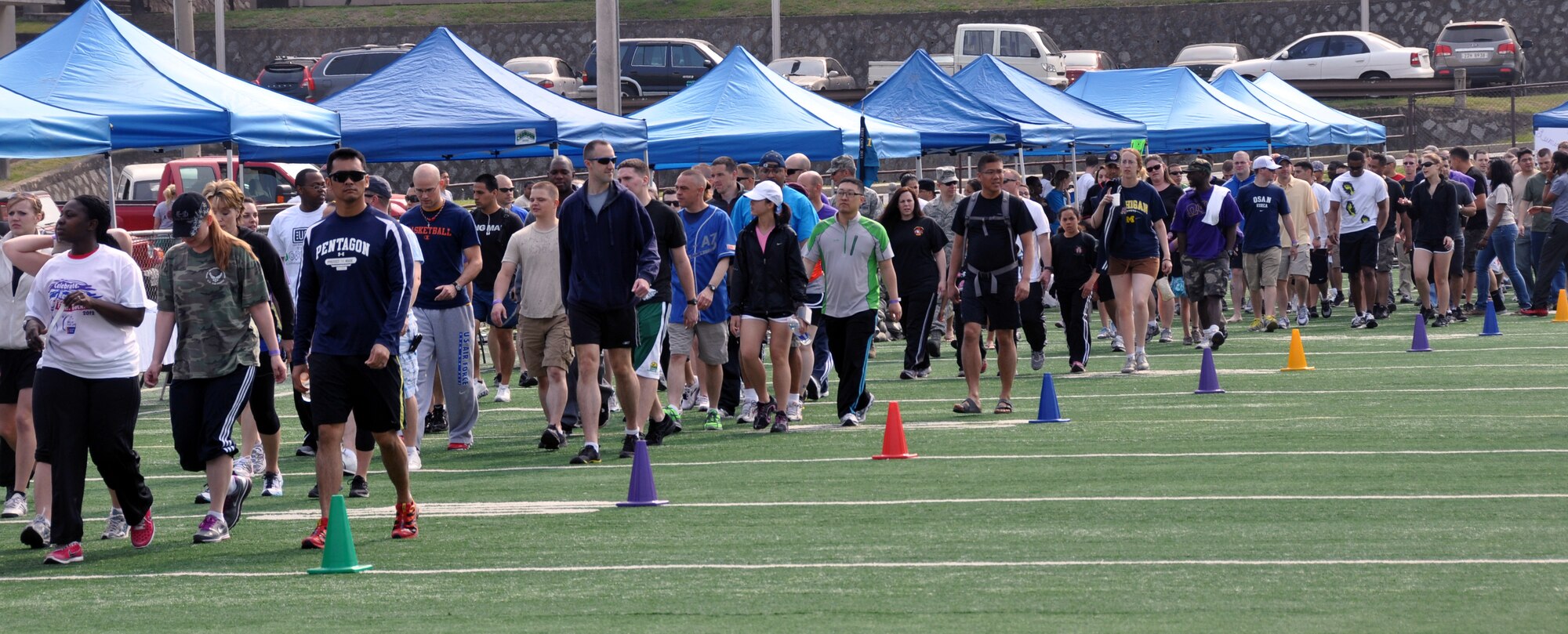More than 600 Airmen, Sailors and Soldiers walked in the 2012 Relay for Life walk at Osan Air Base, Republic of Korea, May 12-13, 2012. The event raised roughly $40,000 in support of the charitable organization.  This was an inaugural event for the Osan community and it was held in the base’s high school stadium.  (U.S. Air Force photo/Airman 1st Class Michael Battles)