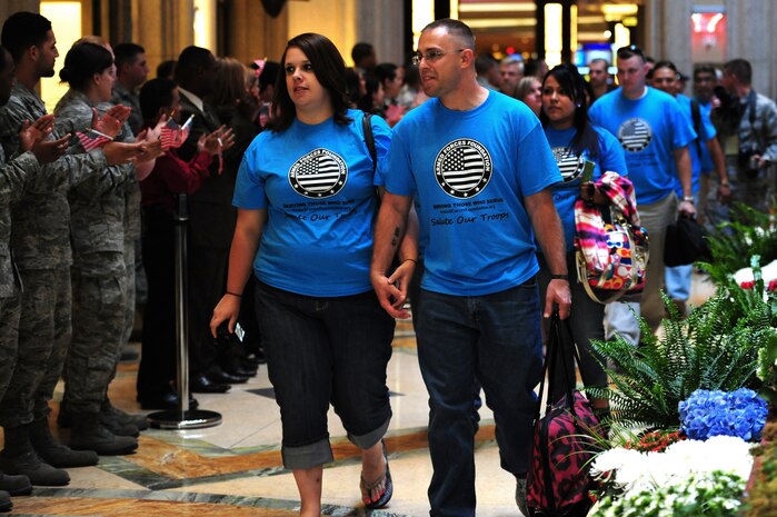 Wounded Warriors are greeted by Nellis Air Force Base Airmen and locals during a "Salute our Troops" event May 16, 2012, at the Palazzo Hotel, Las Vegas, Nev. The wounded service members and their families were treated to a VIP weekend in Las Vegas to show appreciation for their sacrifices. (U.S. Air Force photo by Airman 1st Class Christopher Tam)
