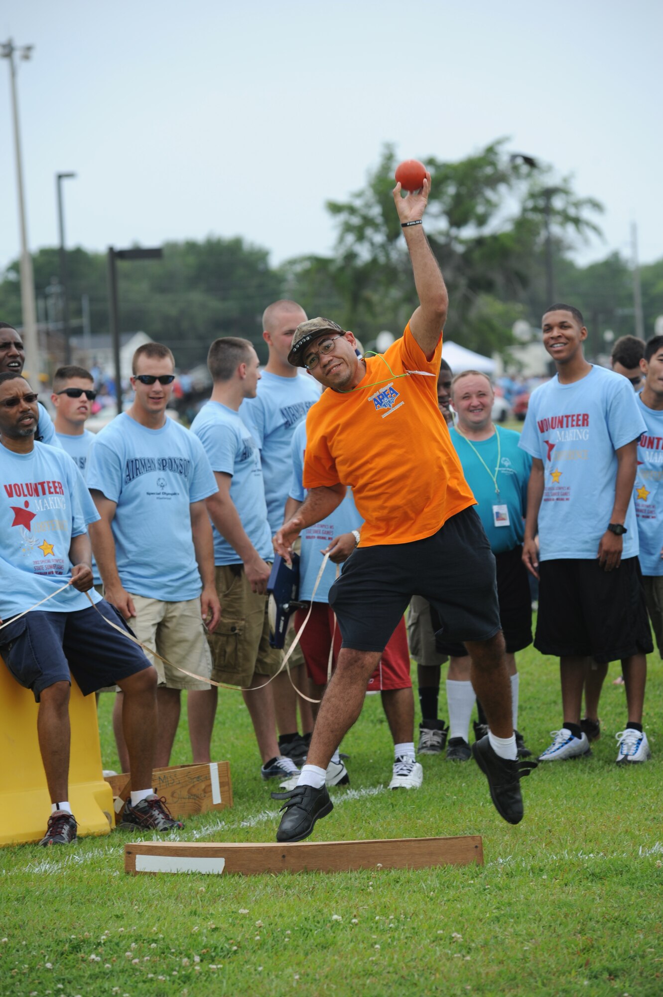 Mike Shempert, athlete, throws the shot put during the Special Olympics Mississippi Summer Games, May 12, 2012, at Keesler Air Force Base, Miss. It’s the 26th year that Keesler has hosted the statewide event. Opening ceremonies took place May 11. Athletic competitions took place throughout the day and were followed by a victory dance May 12. More than 1,200 athletes and coaches and 3,000 volunteers joined forces to make the event a success.  (U.S. Air Force photo by Kemberly Groue)