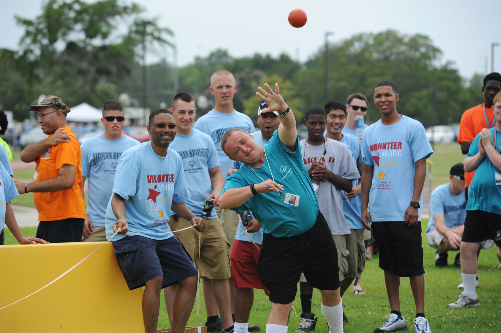 Mike Shempert, athlete, throws the shot put during the Special Olympics Mississippi Summer Games, May 12, 2012, at Keesler Air Force Base, Miss. It’s the 26th year that Keesler has hosted the statewide event. Opening ceremonies took place May 11. Athletic competitions took place throughout the day and were followed by a victory dance May 12. More than 1,200 athletes and coaches and 3,000 volunteers joined forces to make the event a success.  (U.S. Air Force photo by Kemberly Groue)
