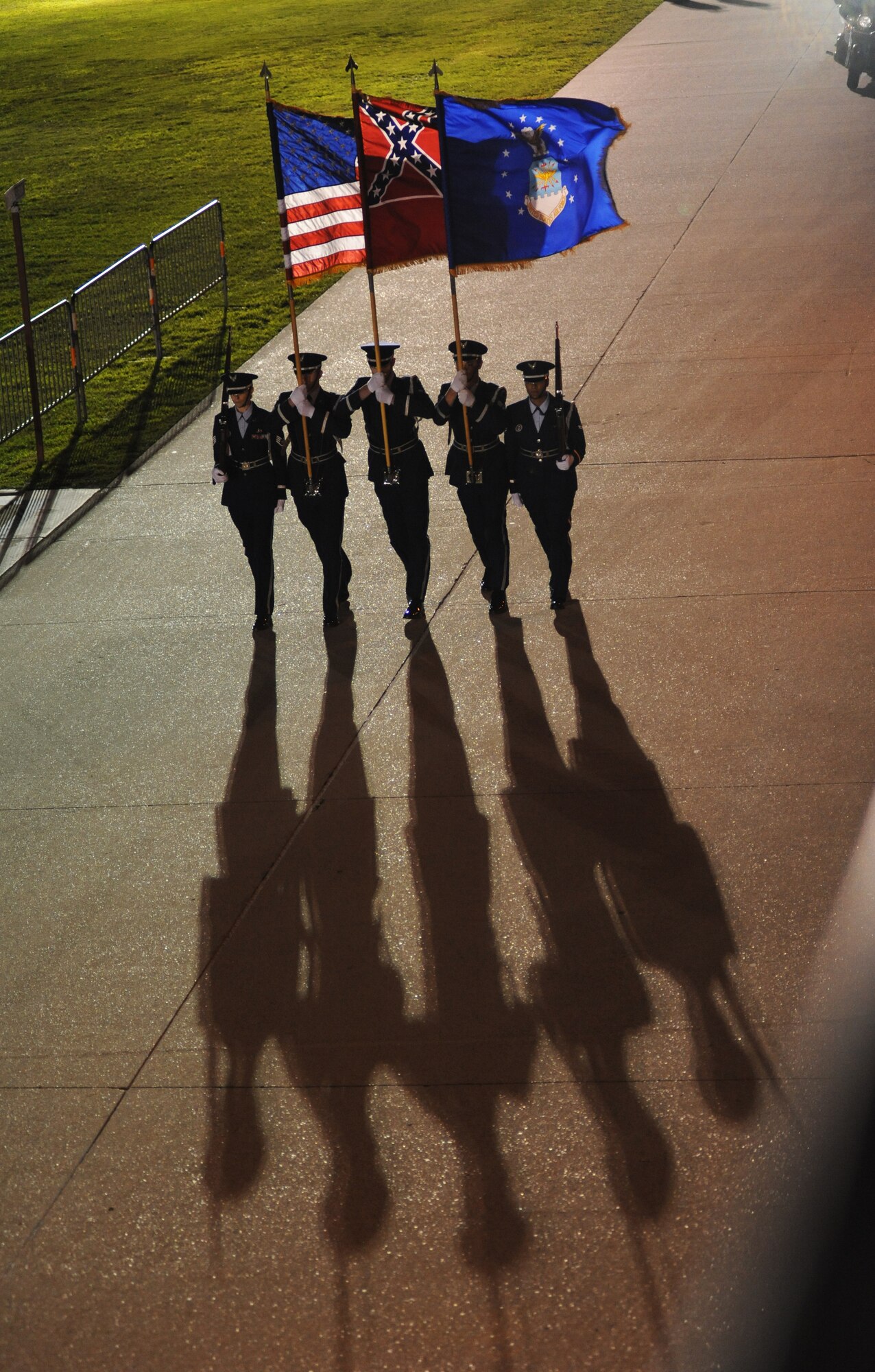 The Keesler Honor Guard marches the colors onto the parade field during the opening ceremonies of the Special Olympics Mississippi Summer Games, May 11, 2012, at Keesler Air Force Base, Miss. It’s the 26th year that Keesler has hosted the statewide event.  Athletic competitions took place throughout the day and were followed by a victory dance May 12. More than 1,200 athletes and coaches and 3,000 volunteers joined forces to make the event a success.  (U.S. Air Force photo by Kemberly Groue)