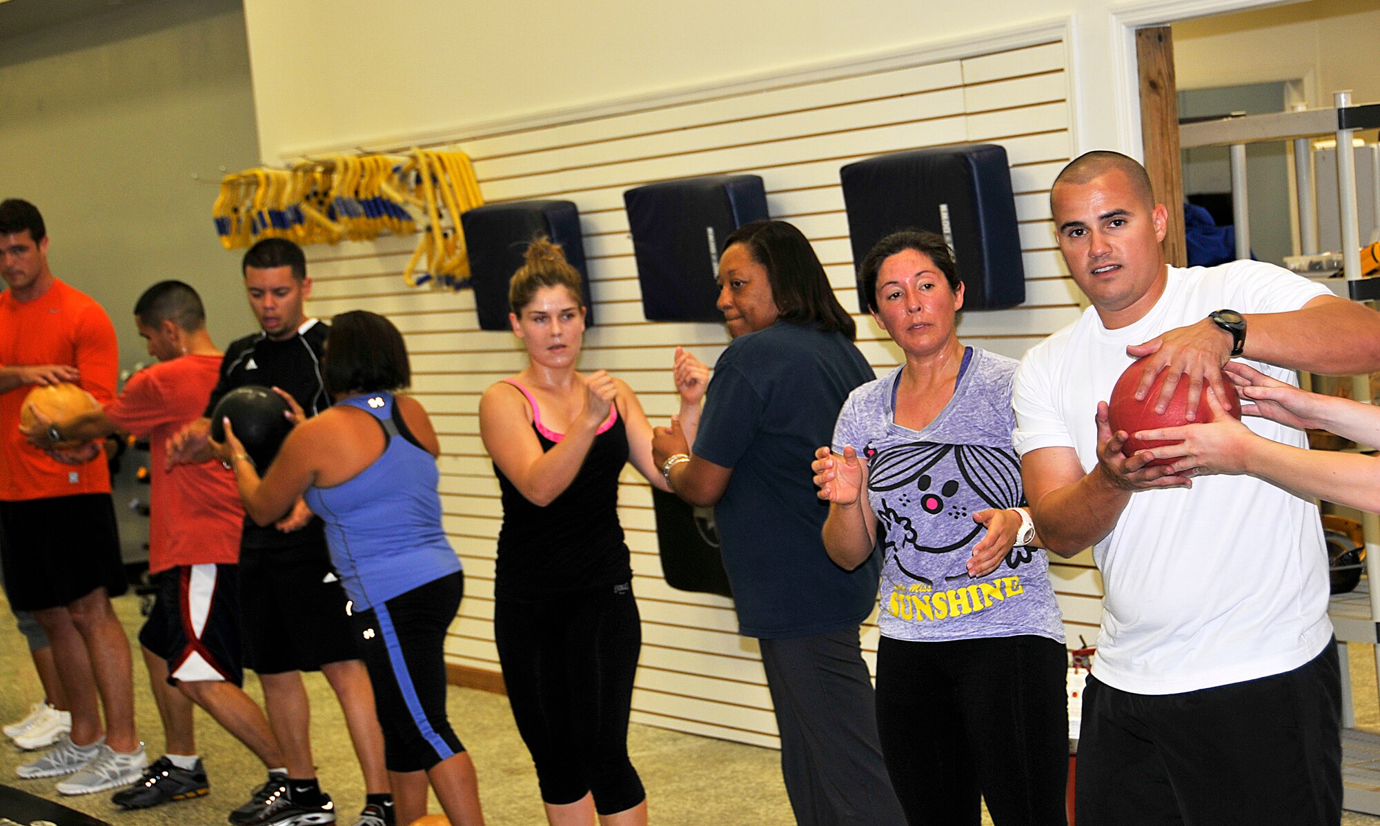 Members participate in a Boot Camp fitness class at the base fitness centers temporary location across the street from the base, inside the old base exchange facility. The $4.5 million renovation of the Sam Johnson Fitness Center is slated to take one year to complete.