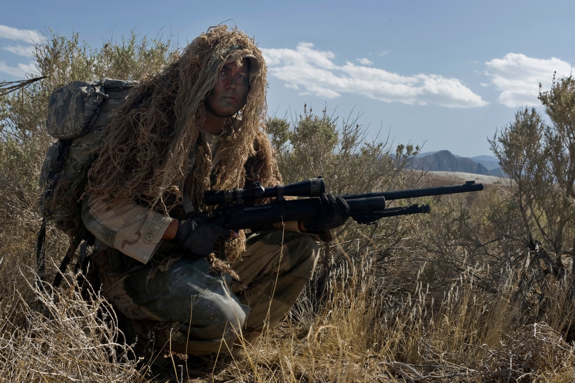 U.S. Air Force Staff Sgt. Alyssa Gomez, 99th Ground Combat Training Squadron instructor, poses with her M24 Sniper Weapon System May 11, 2012, at the Nevada Test and Training Range. Gomez is the ninth female in Air Force history to become a sniper. (U.S. Air Force photo by Airman 1st Class Daniel Hughes)

