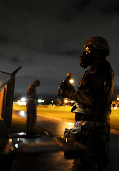 U.S. Air Force Senior Airman Simon Tan, 18th Communication Squadron client systems technician, conducts a post-attack reconnaissance sweep during local operational readiness exercise Beverly High 12-4 on Kadena Air Base, Japan, May 16, 2012. PAR sweeps are conducted during LOREs to check for damage, casualties and unidentified explosive ordnance. (U.S. Air Force photo/Airman 1st Class Brooke P. Beers)