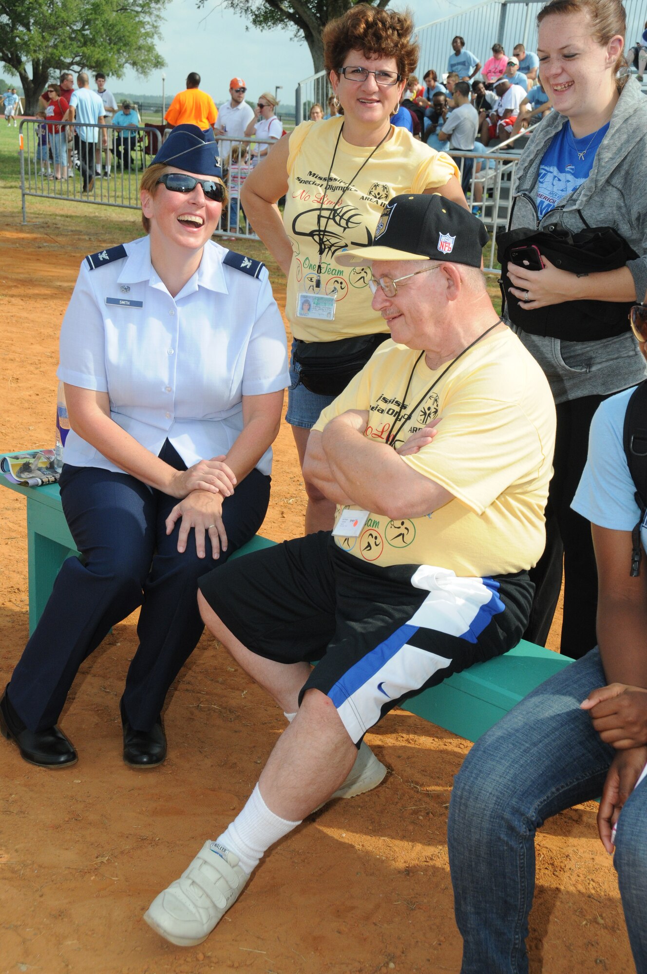 Col. Maureen Smith, 81st Training Group commander, laughs with Jill Mixon, coach; Earl Dragon, athlete; and Alicia Clayton, volunteer, as Dragon waits his turn in the Bocce competition during the Special Olympics Mississippi Summer Games, May 12, 2012, at Keesler Air Force Base, Miss. It’s the 26th year that Keesler has hosted the statewide event. Opening ceremonies took place May 11. Athletic competitions took place throughout the day and were followed by a victory dance May 12. More than 1,200 athletes and coaches and 3,000 volunteers joined forces to make the event a success.  (U.S. Air Force photo by Kemberly Groue)