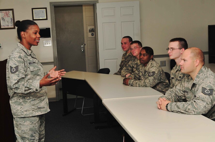 U.S. Air Force Tech. Sgt. Patricia Bustamante, 20th Maintenance Operations Squadron NCOIC of training management and instructional systems design, talks to a group of people, Shaw Air Force Base, S.C., May 15, 2012. Bustamante is the Shaw Spotlight for the week of May 14 through 18. (U.S. Air Force photo by Airman 1st Class Ashley L. Gardner/ Released)
