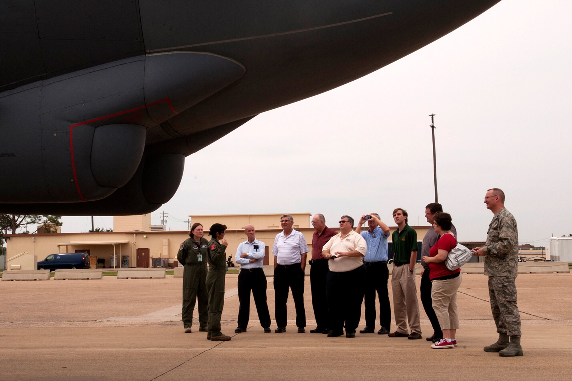 U.S. Air Force Lt. Col. Diana Burian, B-52 electronic warfare officer, talks to a group of clergy about the B-52H Stratorfortress on Barksdale Air Force Base, La., May 15, 2012. The group of clergy took time out from a Lutheran Conference to tour Barksdale and get an up-close look at a B-52. (U.S. Air Force photo by Master Sgt. Greg Steele/Released)