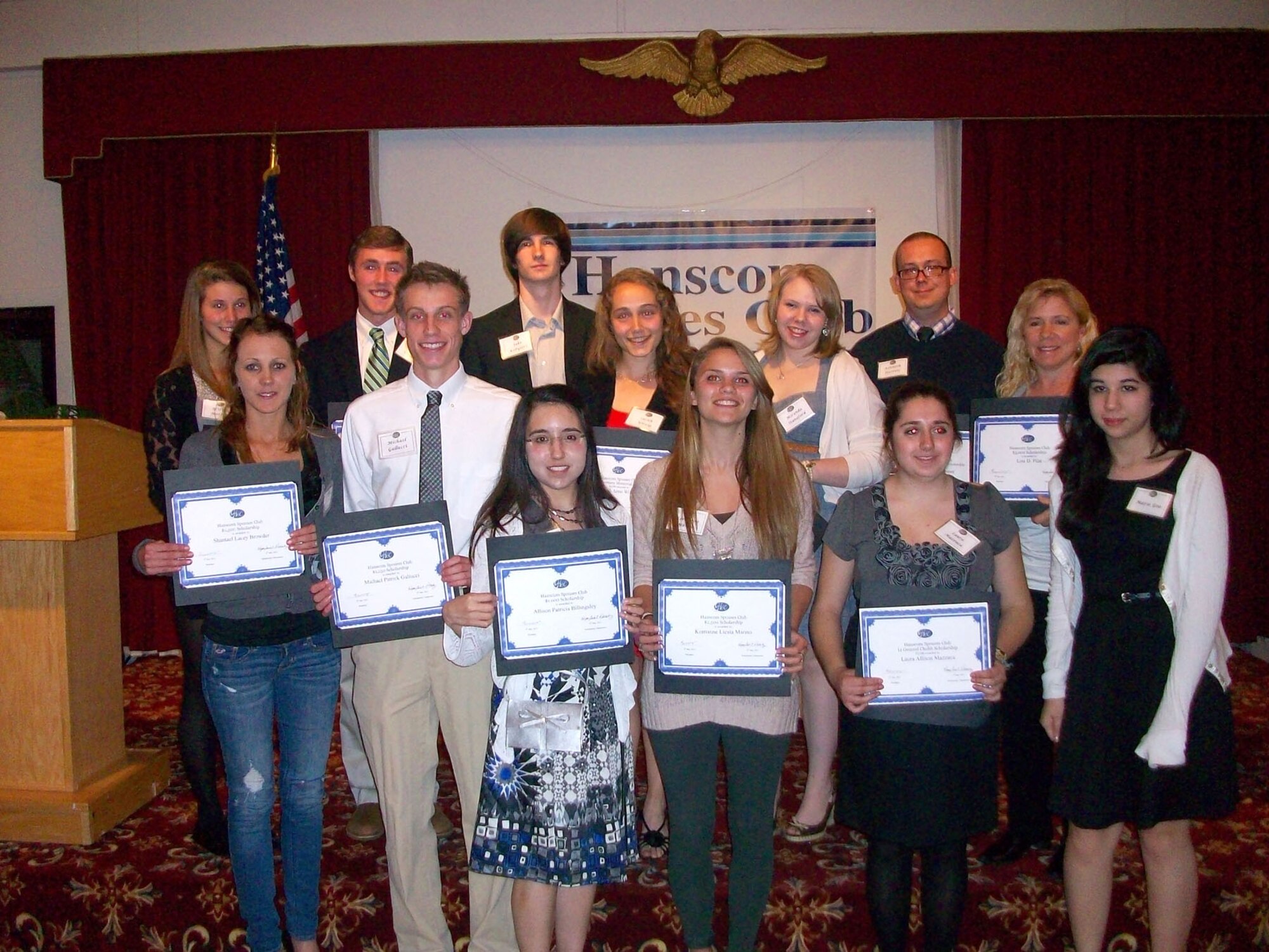 HANSCOM AIR FORCE BASE, Mass. – Thirteen of the 19 Hanscom Spouses Club scholarship recipients pose with their certificates during the 51st annual HSC Scholarship Awards Night at the Minuteman Commons May 9. HSC officers awarded $42,000 in scholarships to the students. (Courtesy photo)