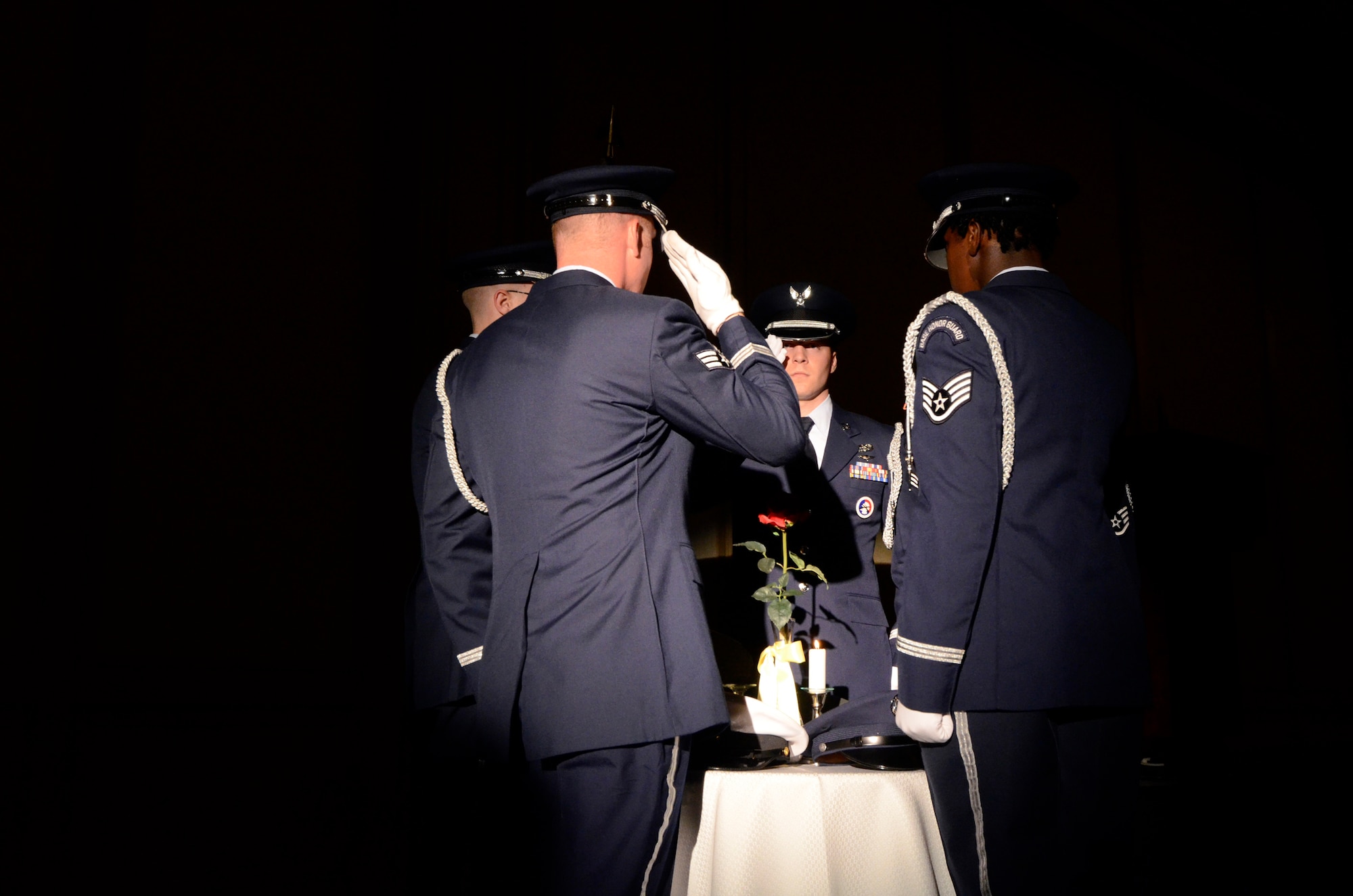 Members of the 94th Airlift Wing Honor Guard perform the Prisoner of War/Missing in Action Remembrance during the Chiefs Recognition Ceremony at the Renaissance Waverly Hotel, Marietta, Ga., May 5. (U.S. Air Force photo/Don Peek)
