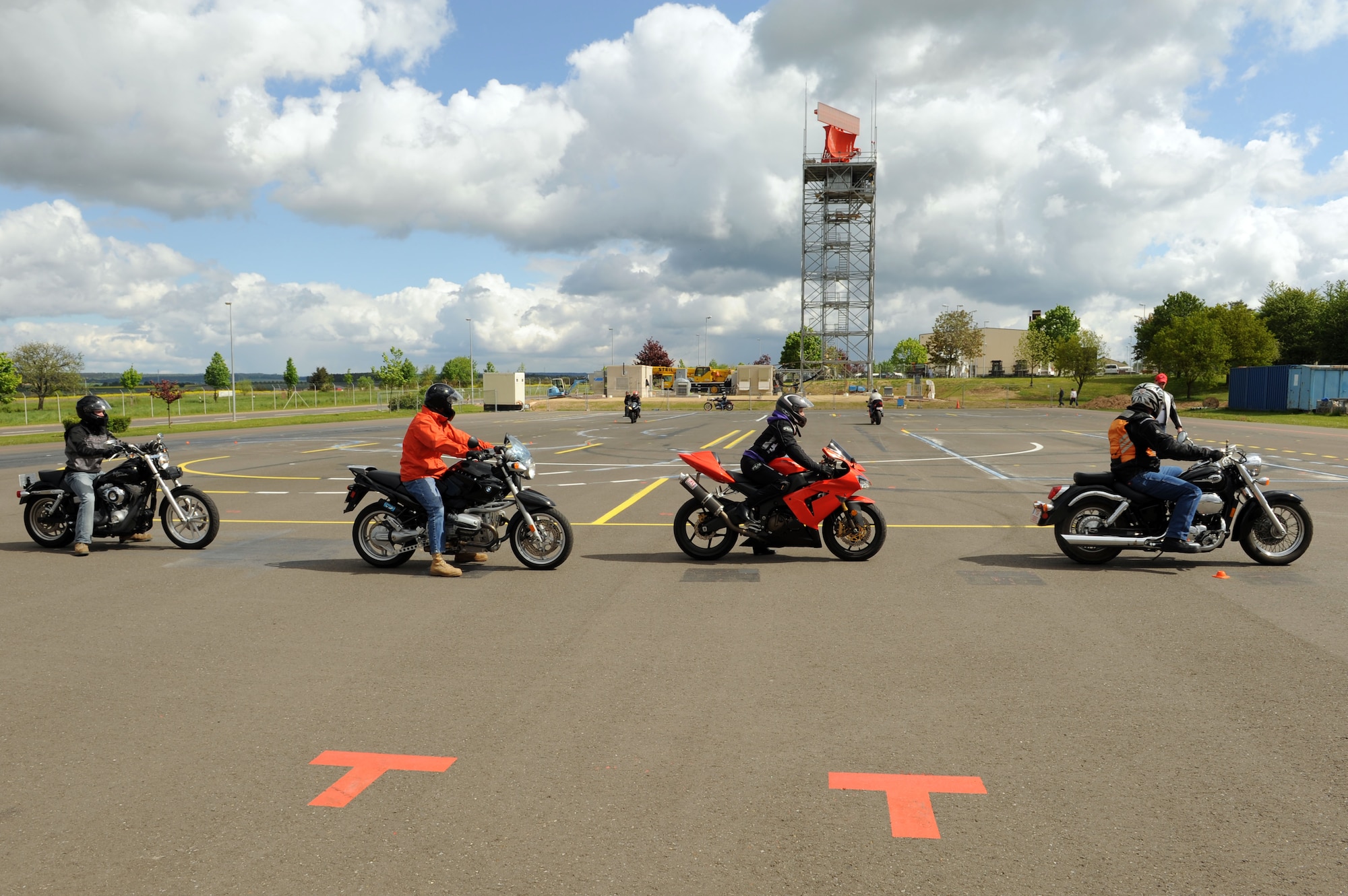 SPANGDAHLEM AIR BASE, Germany – Motorcycle riders execute maneuvers during a motorcycle safety class at the Saber driving course here May 15. The course participants practiced maneuvers to include path of travel, quick stops and obstacle avoidance. The class is geared to improve riders’ skill by performing different maneuvers on the course as well as discussing and reviewing a variety of safety information. The 52nd Fighter Wing Safety office conducts the motorcycle safety course three times monthly. U.S Air Forces in Europe regulations mandate that every motorcyclist on base must take or retake this class once every three years to keep their skillset current. (U.S. Air Force photo by Senior Airman Christopher Toon/Released)