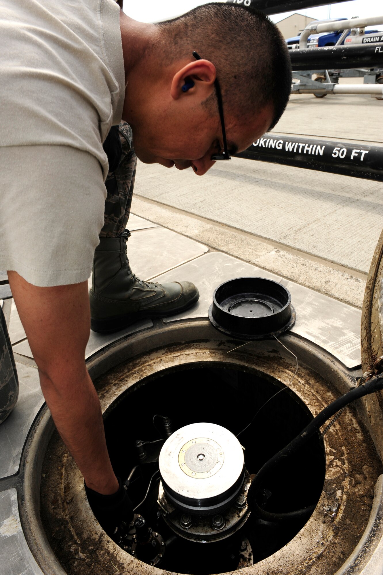 Staff Sgt. Jason Alonzo, 86th Logistics Readiness Squadron fuels distribution shift manager, opens the lid to a hydrogen-pit adaptor at Ramstein Air Base, Germany, May 15, 2012. The Fuels Management Flight recently won its first American Petroleum Institute trophy for having the best fuels management operations in the Air Force. The 86th LRS supports every in-transit aircraft, from multiple commands, wings and agencies that need fuel to complete its mission. (U.S. Air Force photo/ Senior Airman Aaron-Forrest Wainwright)