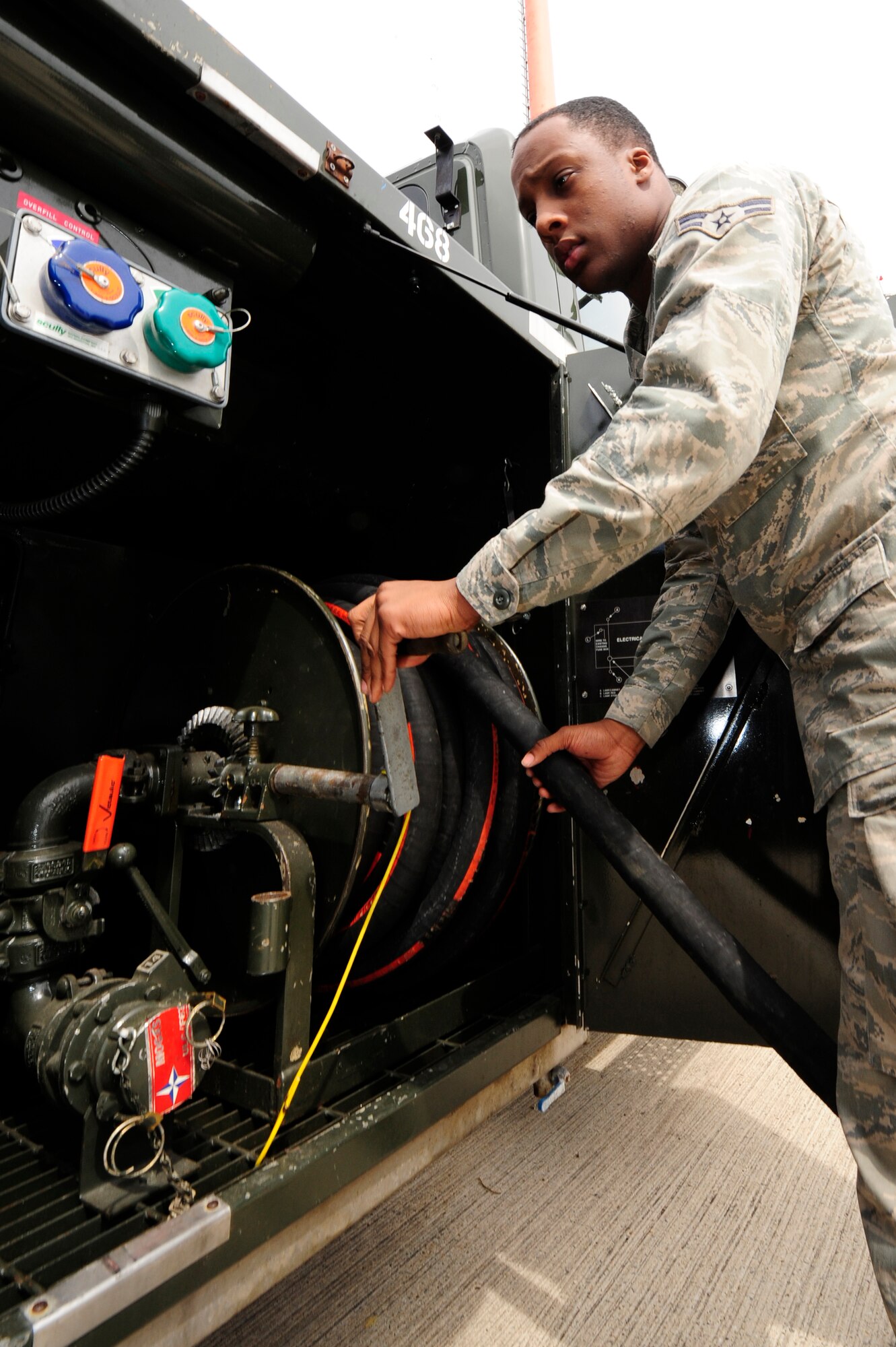 Airman 1st Class Kevin Miles, 86th Logistics Readiness Squadron fuel operator, conducts a vehicle inspection at Ramstein Air Base, Germany, May 15, 2012. The Fuels Management Flight recently won its first American Petroleum Institute trophy for having the best fuels management operations in the Air Force. The 86th LRS supports every in-transit aircraft, from multiple commands, wings and agencies that need fuel to complete its mission. (U.S. Air Force photo/Senior Airman Aaron-Forrest Wainwright)