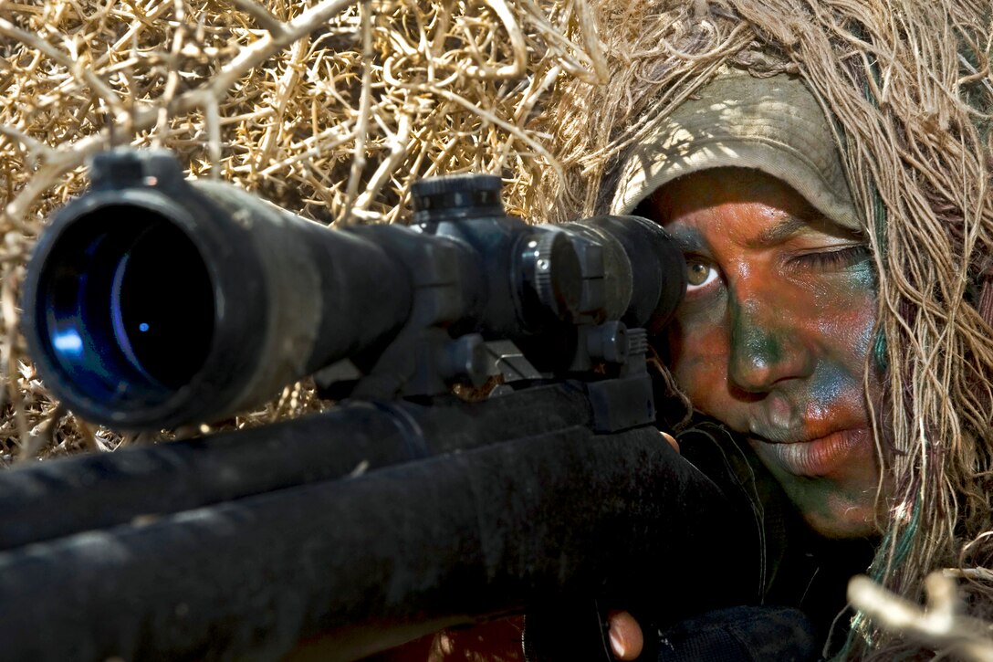 U.S. Air Force Staff Sgt. Alyssa Gomez peers down the scope of her M24 Sniper Weapon System at the Nevada Test and Training Range on Nellis Air Force Base, Nv., May 11, 2012. Gomez, a sniper assigned to the 99th Ground Combat Training Squadron, is the ninth female in Air Force history to become a sniper after graduating from a 19-day sniper course on Fort Bliss, Texas. 