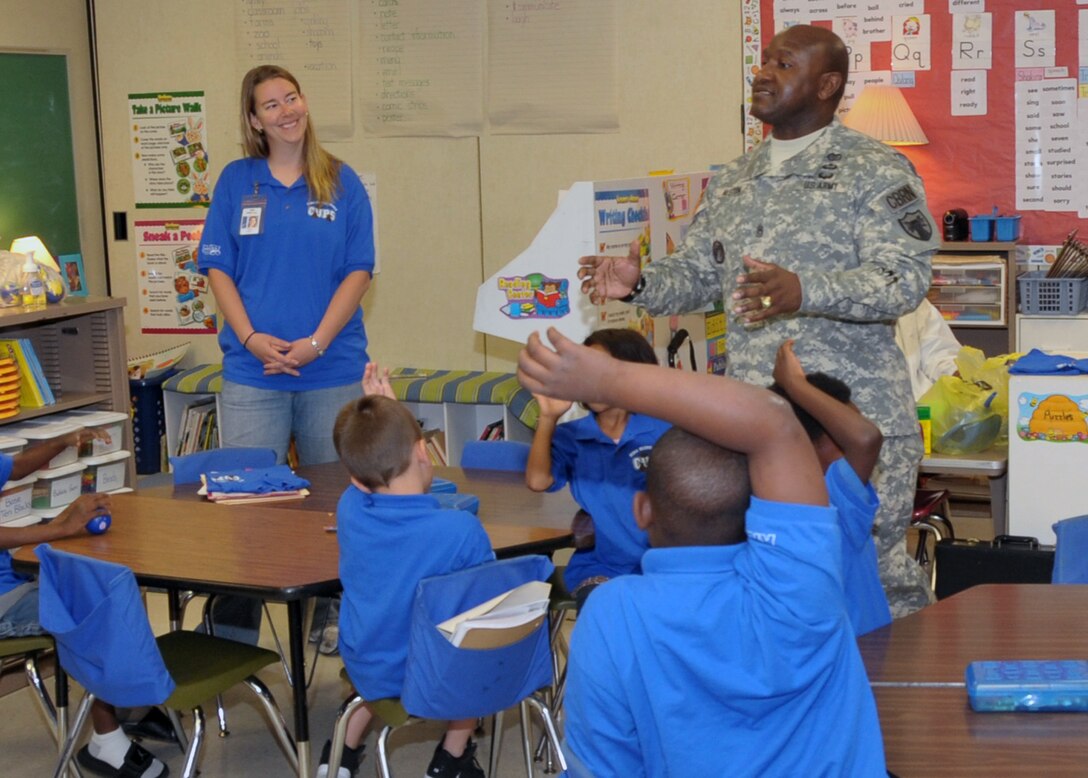 OMAHA, Neb. - Command Sgt. Maj. Patrick Alston, Senior Enlisted Leader, U.S. Strategic Command gives an overview of USSTRATCOM responsibilities and mission areas, as well as a talk on the importance of education to 1st grade students at King Elementary School, 16 May.