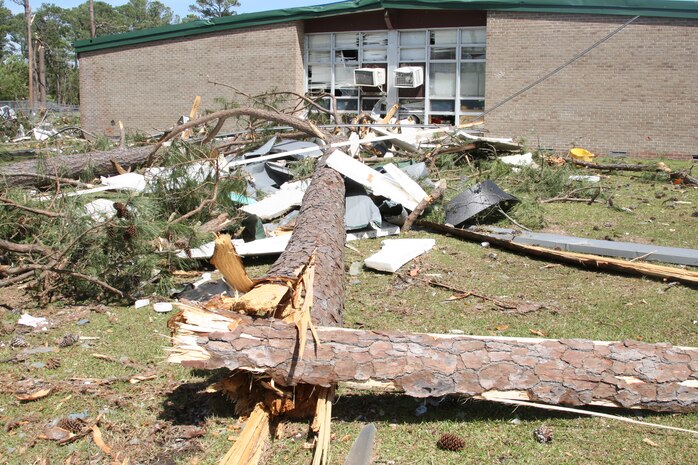 Day after tornado destruction.  Damage assessment of Tarawa Terrance housing area aboard Marine Corps Base Camp Lejuene,  N.C., Apr. 18, 2011.