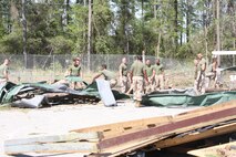 Day after tornado destruction.  Damage assessment of Tarawa Terrance housing area aboard Marine Corps Base Camp Lejuene,  N.C., Apr. 18, 2011.