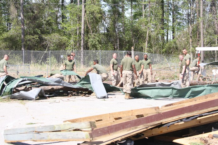 Day after tornado destruction.  Damage assessment of Tarawa Terrance housing area aboard Marine Corps Base Camp Lejuene,  N.C., Apr. 18, 2011.